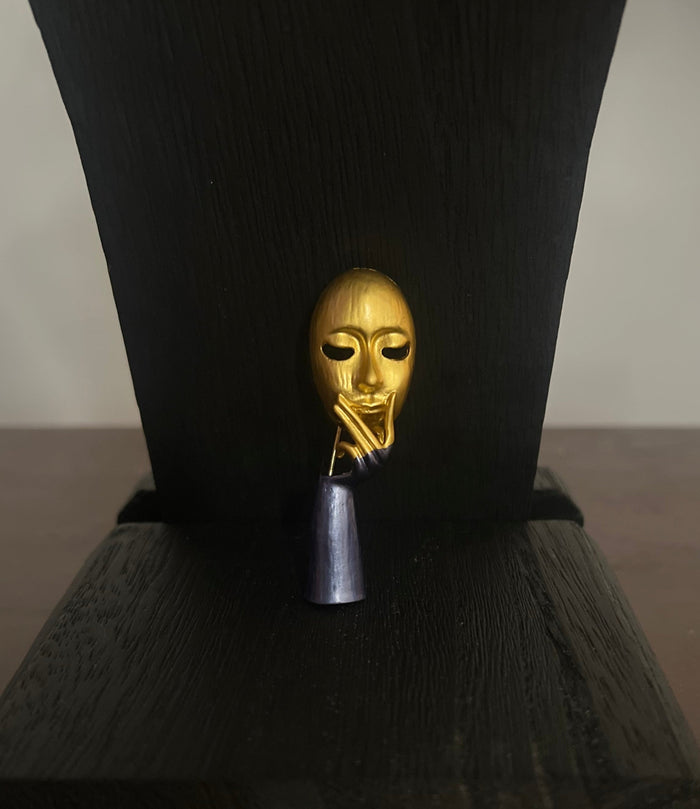 The Mysterious Mask Brooch