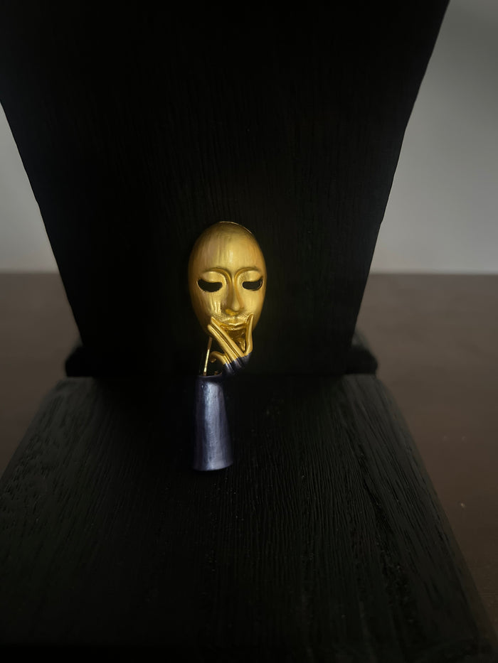 The Mysterious Mask Brooch